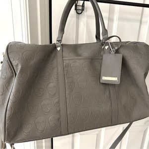 Gray skull brand new Betsey Johnson travel bag/ duffel bag